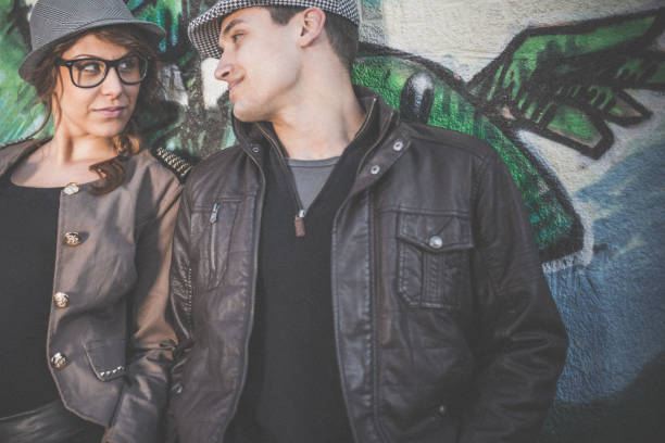 istock Couple flirting outdoors in the city 890349492