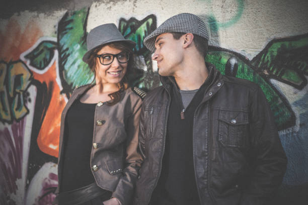 istock Couple flirting outdoors in the city 890349722