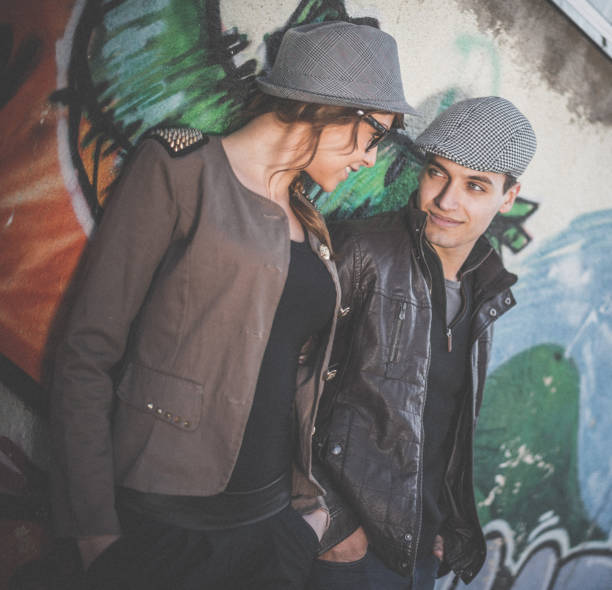 istock Couple flirting outdoors in the city 890355908