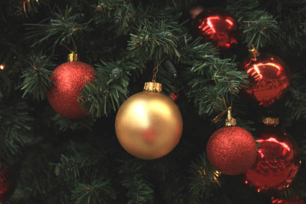 istock Red and gold Christmas ornaments 890358214