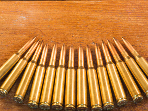 istock Many bullet on the wood 890366922