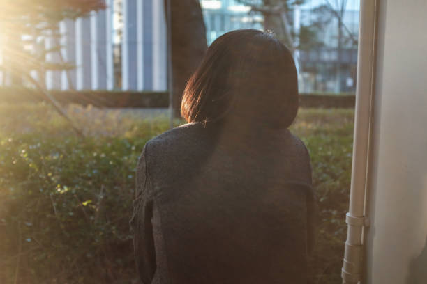 istock Depressed woman at outside 890369532
