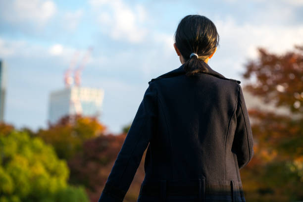 istock Woman walking at the city 890377396