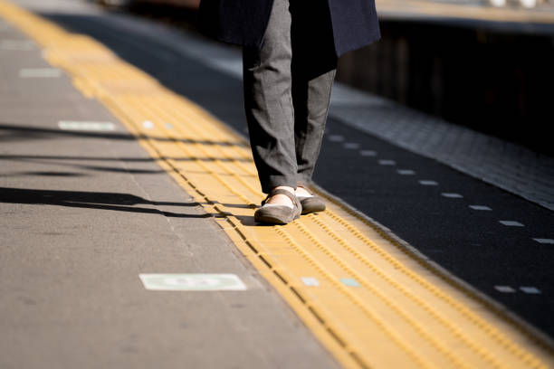 istock Woman walking at station 890377752