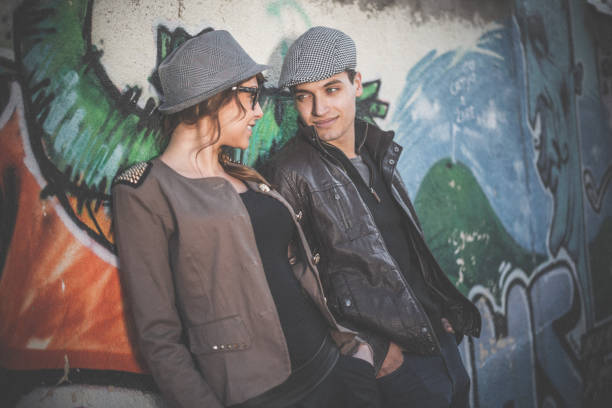 istock Couple flirting outdoors in the city 890380332