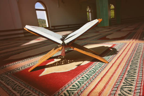 istock Quran in the mosque - open for prayers 890385744