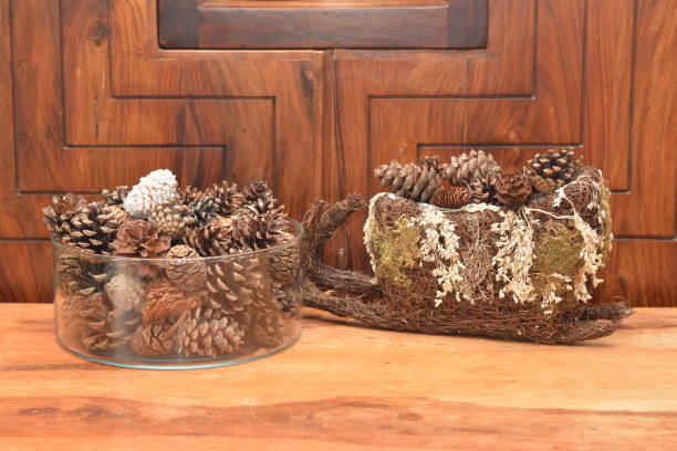 istock cones in a vase and in a sled 890392990