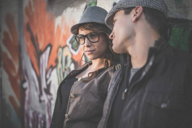 istock Couple flirting outdoors in the city 890393080