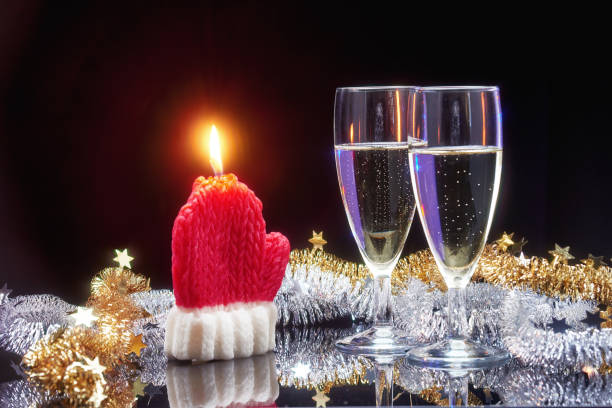Cropped shot of a couple toasting during a romantic dinner