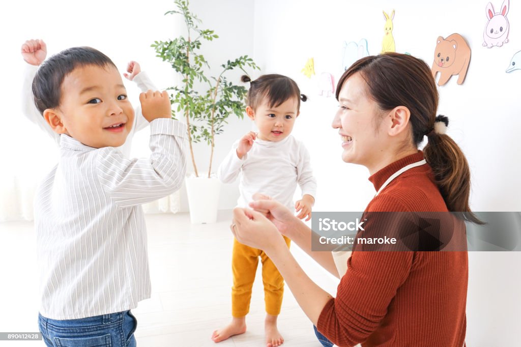 Children and teacher at Kindergarten Preschool Stock Photo