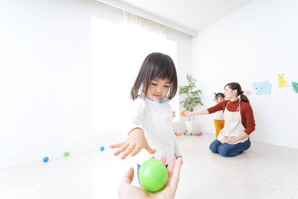istock Children and teacher at Kindergarten 890412438