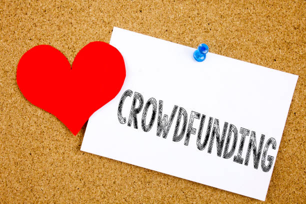istock Conceptual hand writing text caption inspiration showing Crowdfunding concept for Business Fundraising Project Funding and Love written on sticky note, reminder cork background with copy space 890412662