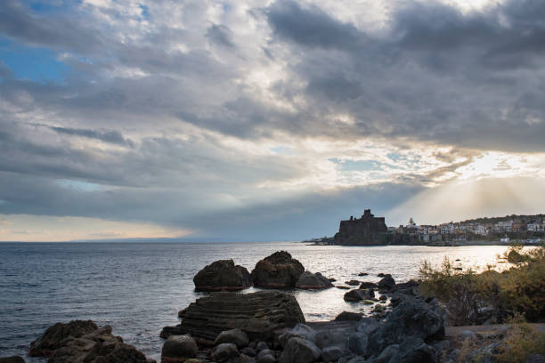 istock Castle of Aci Catello with cloudy sky - Sicily 890423844
