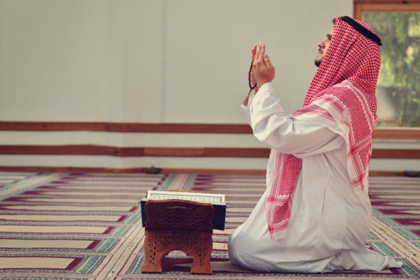 istock Religious muslim man praying inside the mosque 890423998