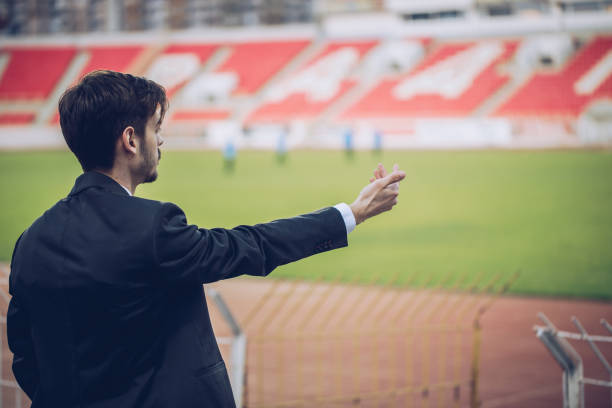 Young scout Manager man standing on stadium grandstand club soccer photos stock pictures, royalty-free photos & images