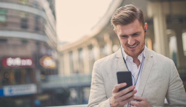 istock Attractive young man with headphones 890446308