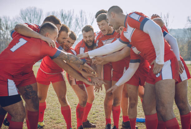 istock Rugby players huddling during time out 890448444