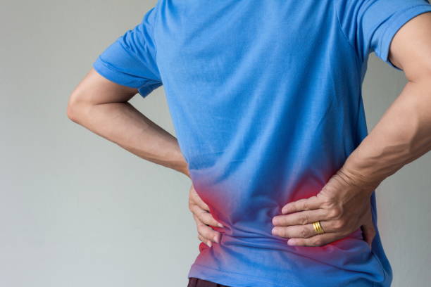 asian man have back pain with copy space stock photo