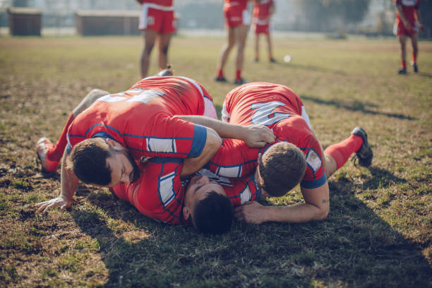 istock Rugby players doing warm up exercises 890453502