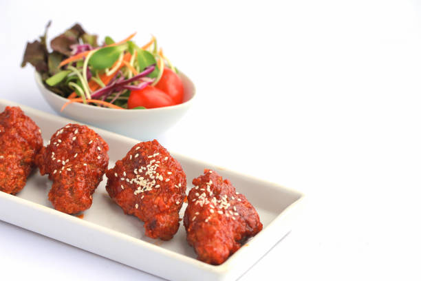 istock Bonchon Chicken spicy and sweet taste on white table. 890456072