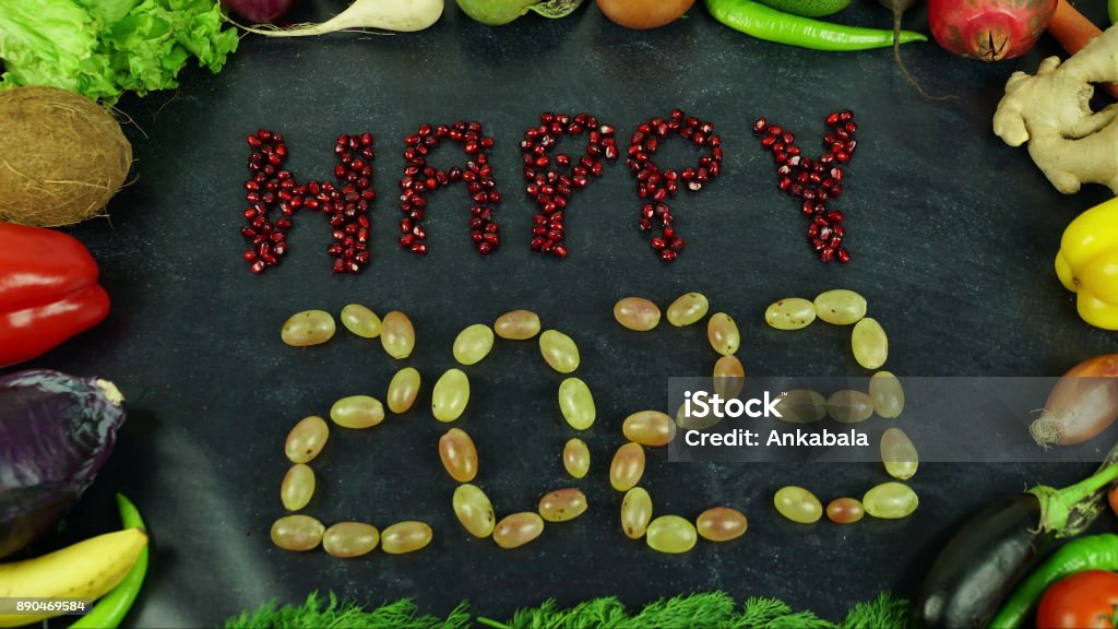 Happy 2023 fruit stop motion Organic fruits and vegetables for all seasons and for healthy life on the hand 2015 Stock Photo
