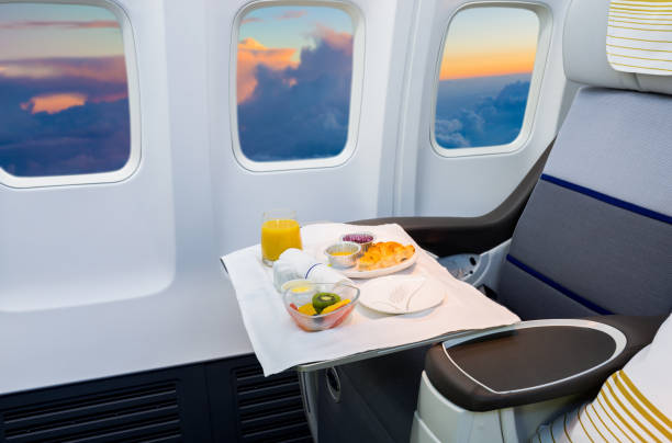 Served Lunch in Aircraft Airplane cabin business class interior and meal airplane food stock pictures, royalty-free photos & images