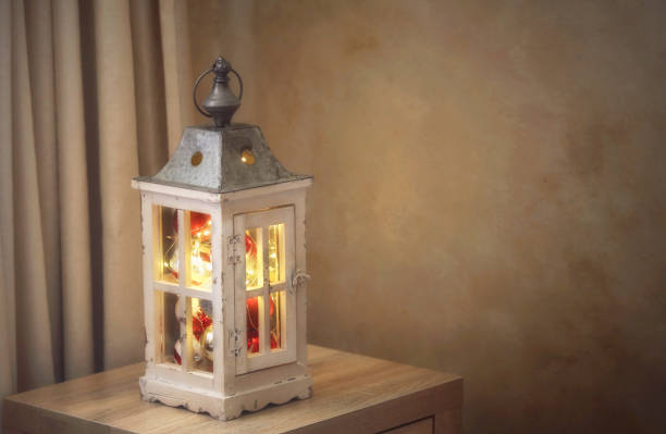 istock Lantern with Christmas decorations and fairy lights 890498202