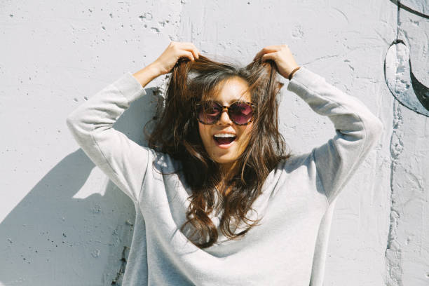 istock the lady relax in front of the wall 890523690