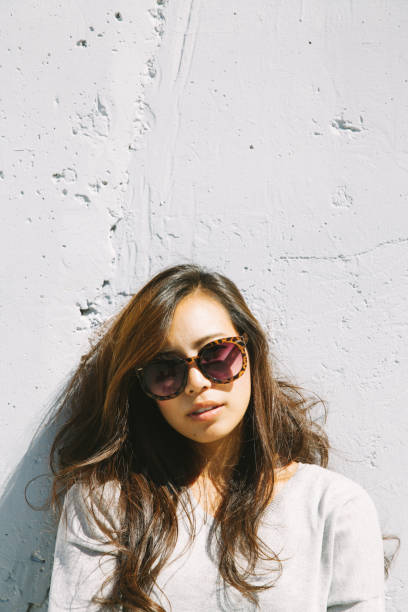 istock the lady relax in front of the wall 890523712