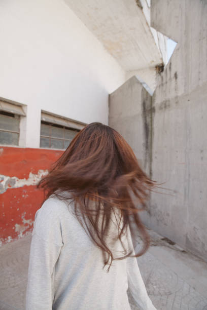 istock the lady relax in front of the wall 890524058