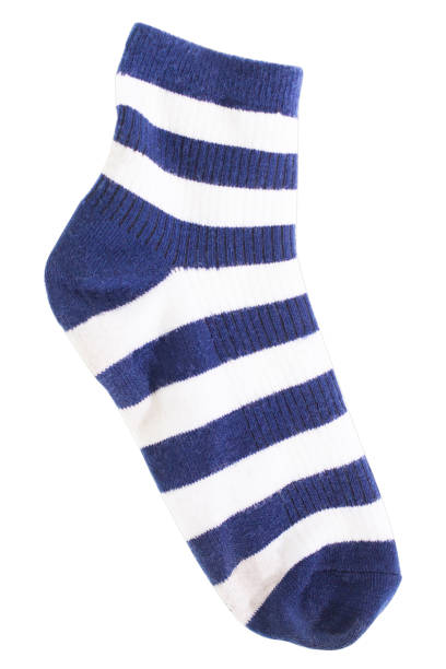istock White and blue socks isolated white background. 890531520