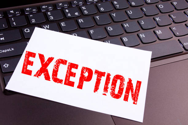 istock Writing Exception text made in the office close-up on laptop computer keyboard. Business concept for Exceptional Exception Management,  Workshop on the black background with copy space 890578212