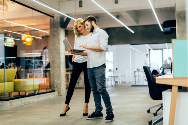 istock Colleagues brainstorming in the office 890590028