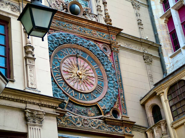 Big hours (Gros-Horloge) in Rouen, France Vintage Large Clock (1389) on the eponymous street (rue du Gros-Horloge) in Rouen, France rue du gros horloge photos stock pictures, royalty-free photos & images