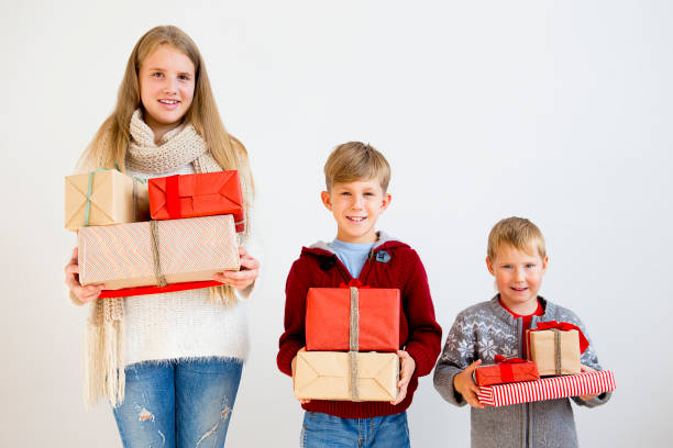 istock Kids celebrating christmas 890597688