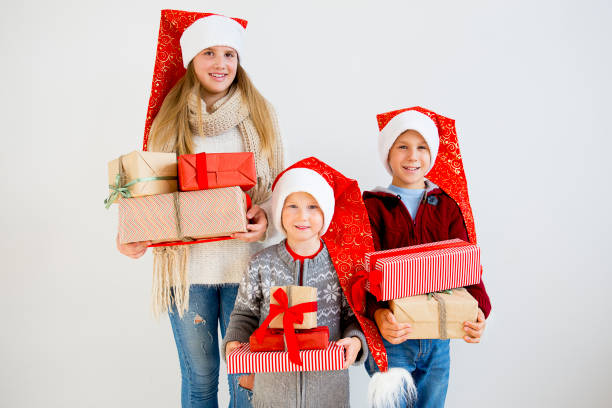 istock Kids celebrating christmas 890597836