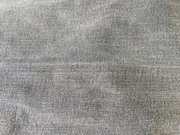 istock Denim jeans background, Jeans texture, denim fabric. Black background. 890597974
