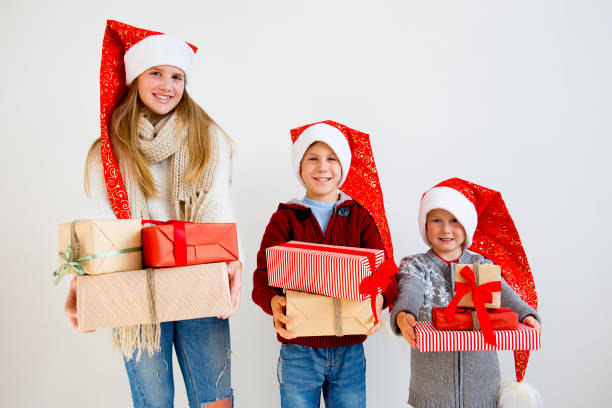 istock Kids celebrating christmas 890598110
