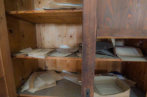 istock wood cabinet with books 890598612