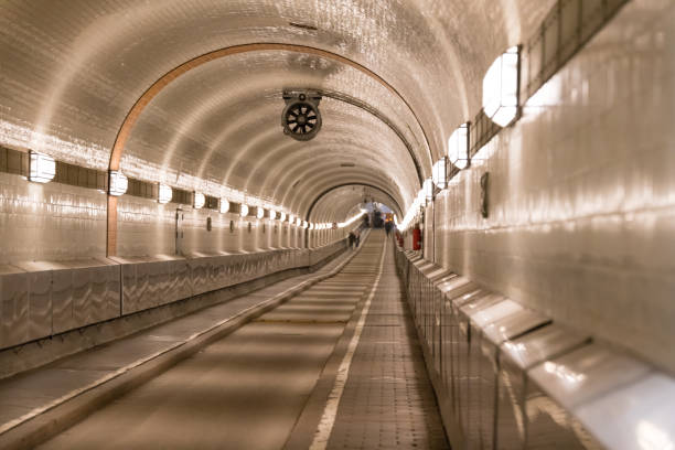 People walking through the old Elbtunnel in Hamburg Germany