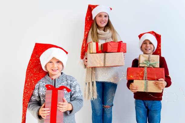 istock Kids celebrating christmas 890601420