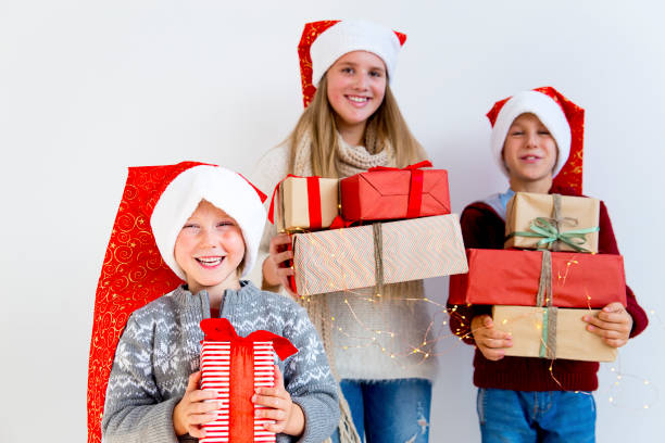 istock Kids celebrating christmas 890603672