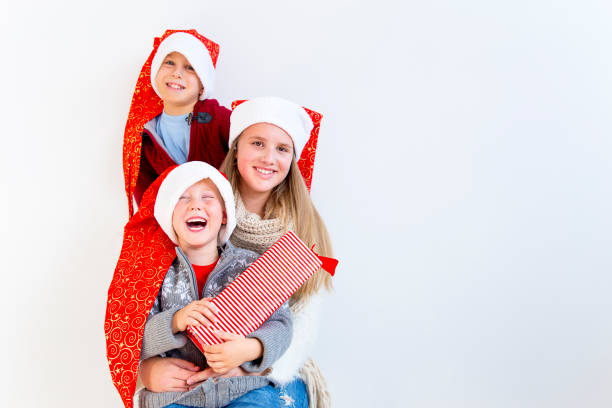 istock Kids celebrating christmas 890603942