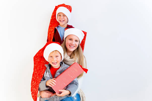 istock Kids celebrating christmas 890604154
