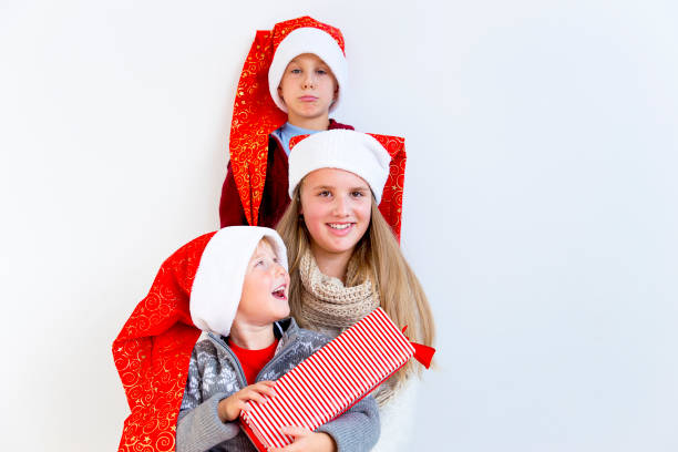 istock Kids celebrating christmas 890604304