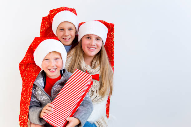 istock Kids celebrating christmas 890604398