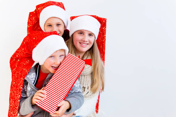 istock Kids celebrating christmas 890604532