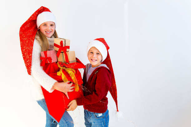 istock Kids celebrating christmas 890607436