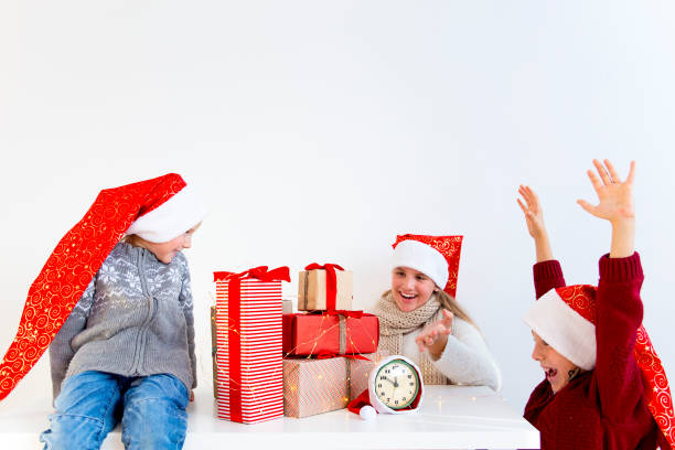 istock Kids celebrating christmas 890611800