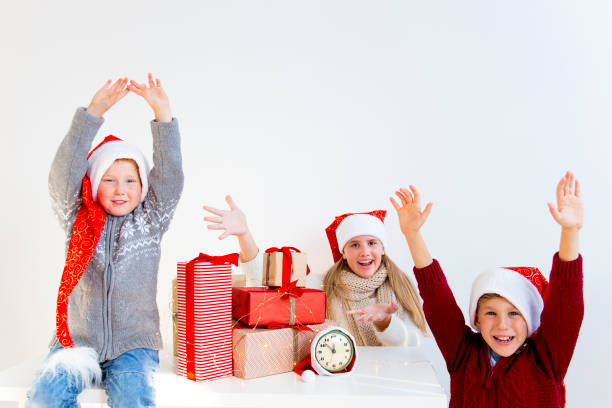 istock Kids celebrating christmas 890611992